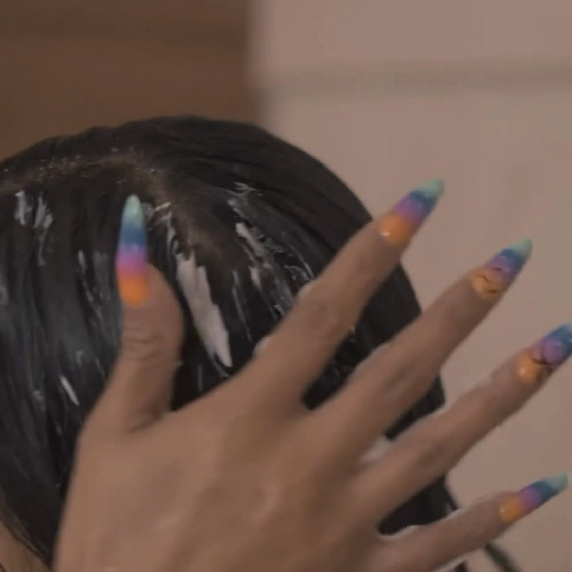 Model using product in her hair - old product image by HOB India