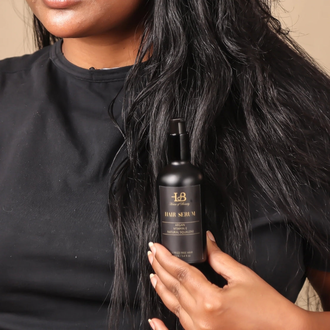 Model using hair serum - copy again - old product image of HOB India
