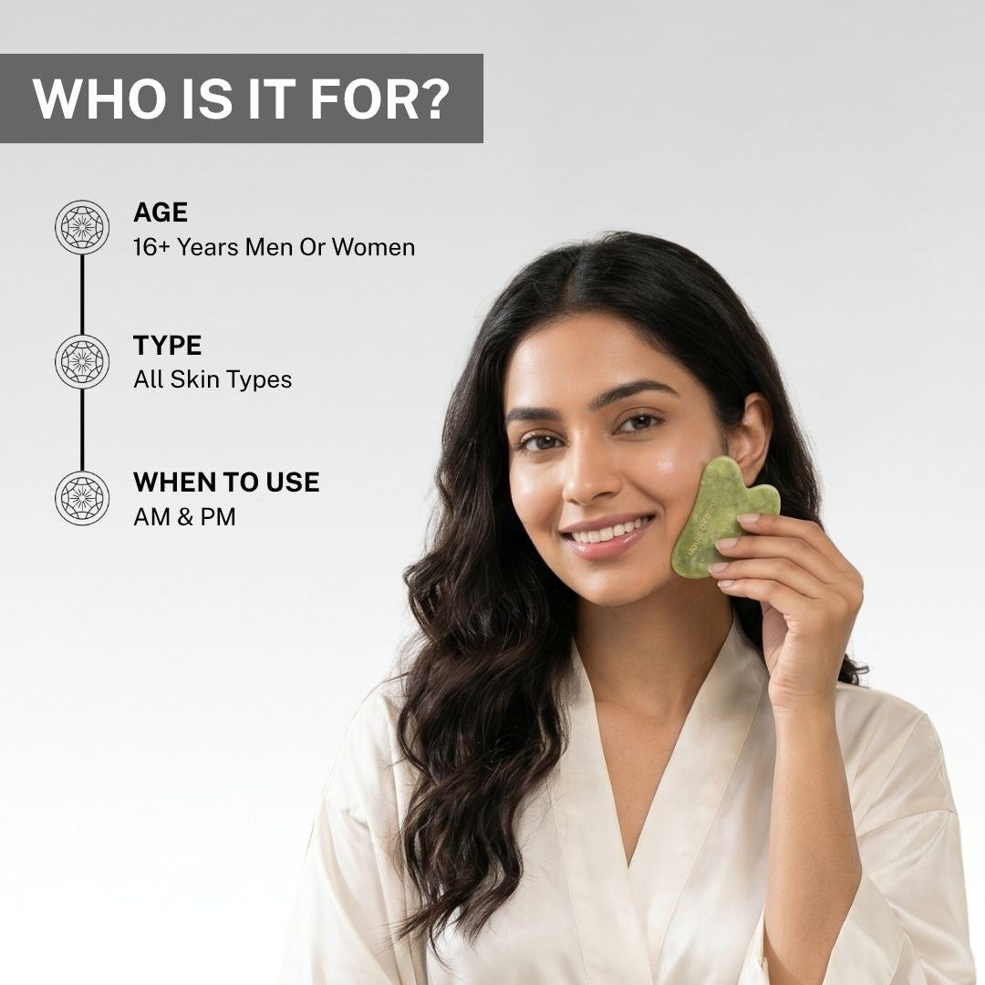 Woman holding House of Beauty Jade Guasha on face showing product is suitable for age 16+ men and women, all skin types, for AM and PM use daily