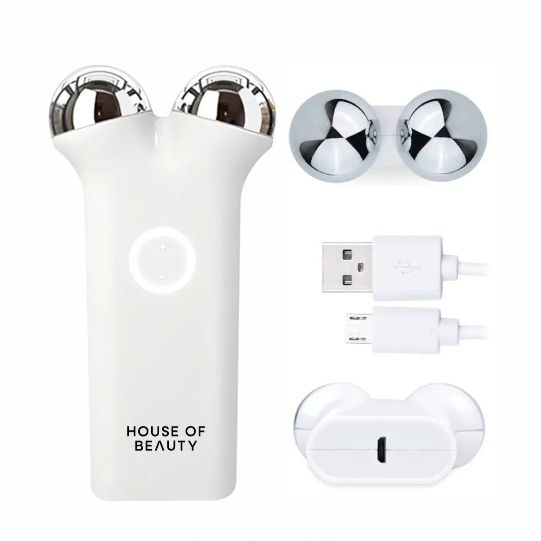 House of Beauty Face Lift Pro microcurrent device with included accessories: interchangeable massage heads, USB charging cables, and charging base, displayed on a white background.