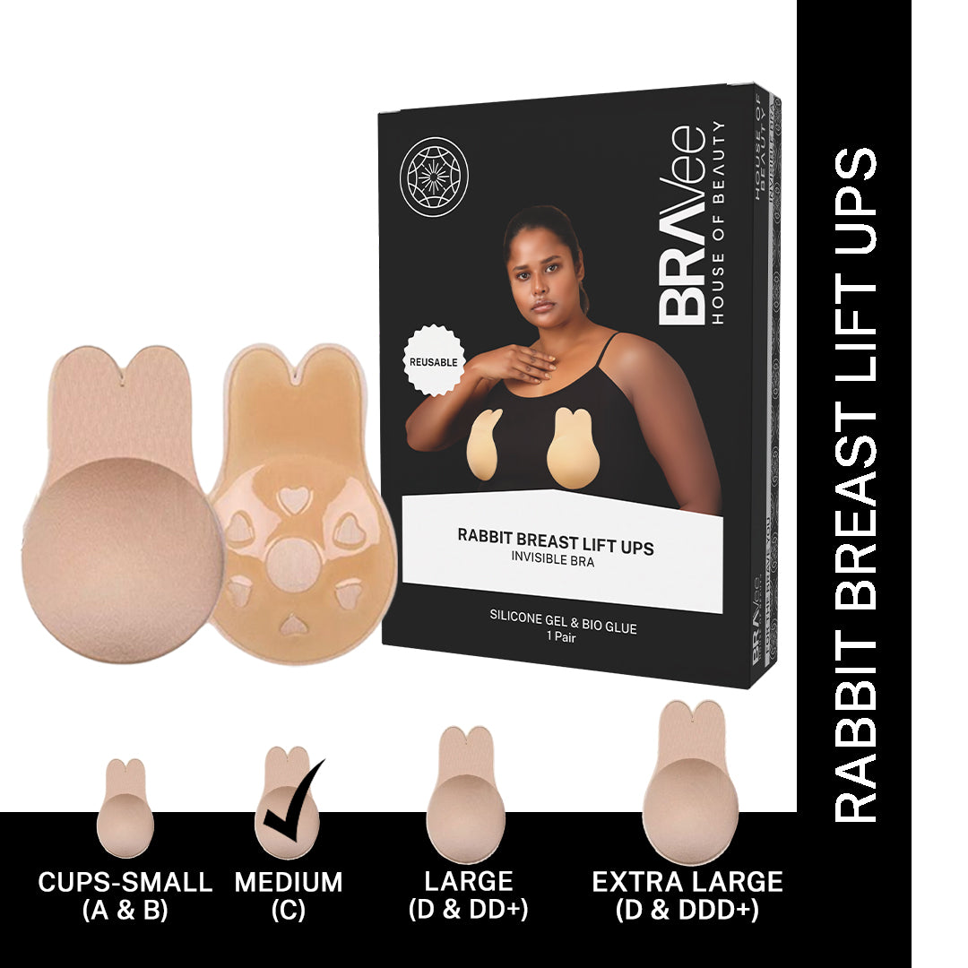 BRAVee House of Beauty Rabbit Breast Lift Ups sizing guide. Shows the product box and a pair of the lifts, with four sizes displayed at the bottom: Cups-Small (A & B), Medium (C), Large (D & DD+), and Extra Large (D & DDD+). The Medium (C) size has a checkmark, indicating it is the featured size.