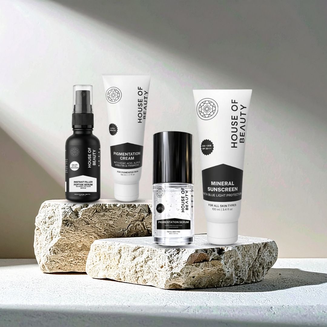 Skincare product collection displayed on wooden blocks, featuring bottles labeled Geranium Arbutin Niacinamide, Brown Spot Corrector, Pigmentation Reduction Cream, and Acai Berry Red Raspberry Passion Fruit, all with bright yellow labels.