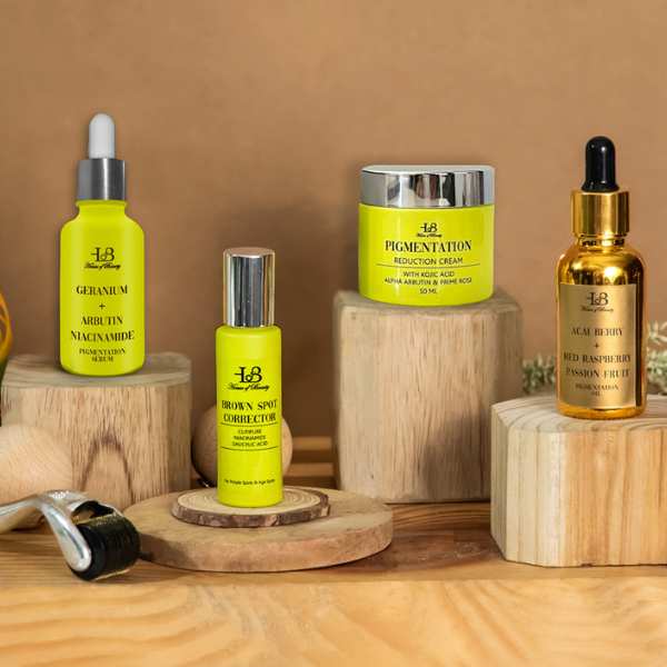 Skincare product collection displayed on wooden blocks, featuring bottles labeled Geranium Arbutin Niacinamide, Brown Spot Corrector, Pigmentation Reduction Cream, and Acai Berry Red Raspberry Passion Fruit, all with bright yellow labels.