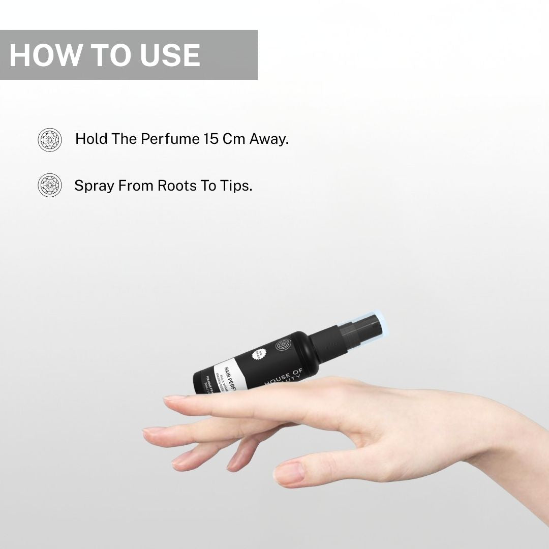 Instructions on how to use House of Beauty Hair Perfume, with a hand holding the bottle and demonstrating how to spray it from roots to tips, holding it 15 cm away from the hair.