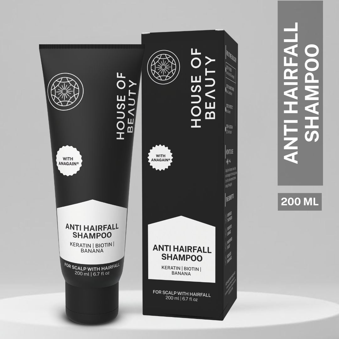 Black House of Beauty Anti Hairfall Shampoo 200ml tube and packaging box displayed on a clean grey platform background.