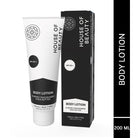 “House of Beauty Body Lotion tube placed beside its black product box, labeled Body Lotion with almond, niacinamide, and shea butter, 200 ml.”