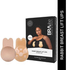 Product image for BRAVee House of Beauty Rabbit Breast Lift Ups Invisible Bra. Shows the black product box, which features a woman wearing a black top and the bra lifts applied, next to a pair of the reusable silicone nipple covers/lift ups. The product is described as a reusable invisible bra made with silicone gel and bio glue.